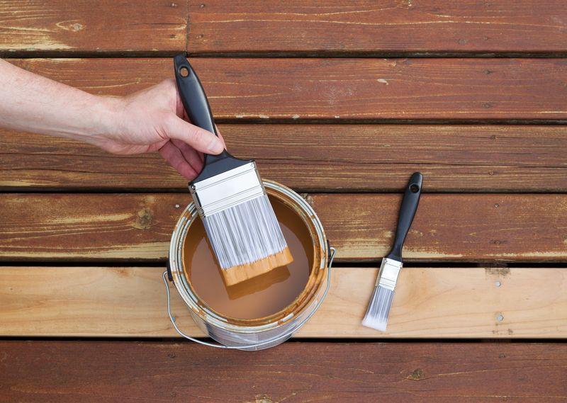 When Should I Stain my New Deck? - Econo Decks - Deck and Fence Services - Featured Image